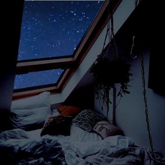 starry view by narrow dormer window 