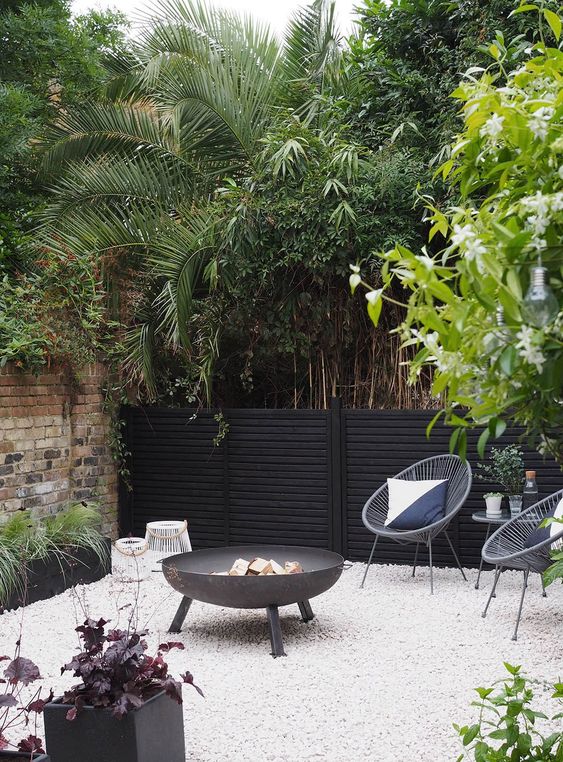 cozy black house backyard style!