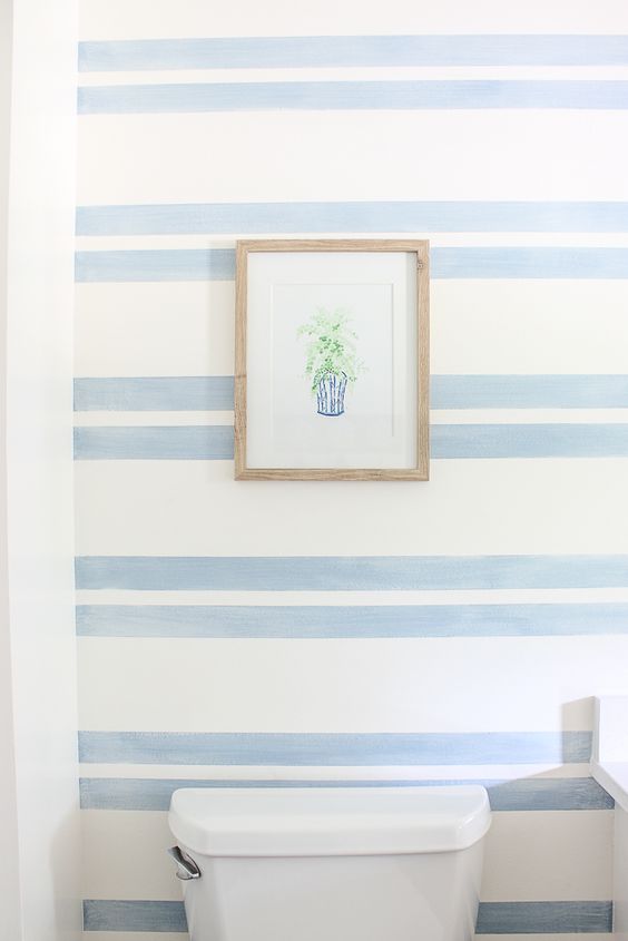 the blue stripe accent wall for a bathroom