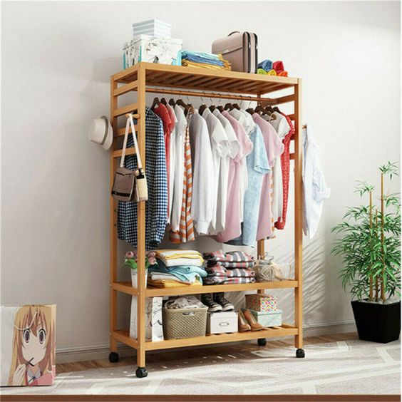 clothes rack to save space in a small bedroom