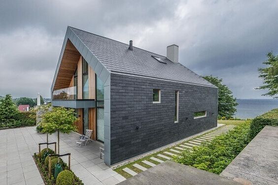 Scandinavian home exterior with cupa stone