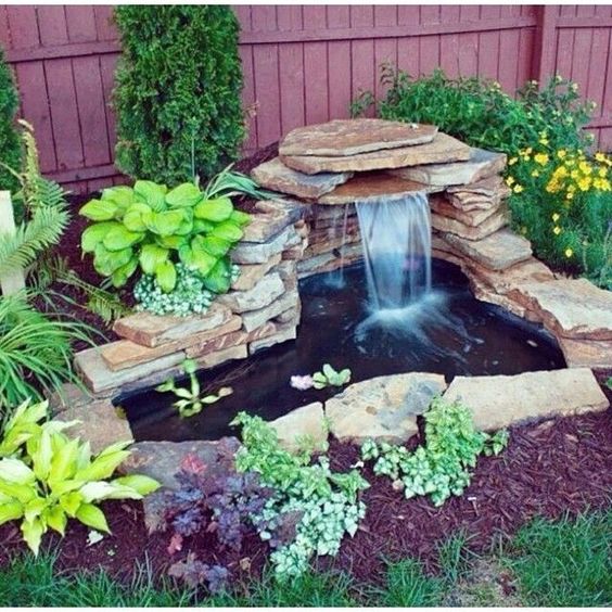 DIY layer bed water feature for a small pond