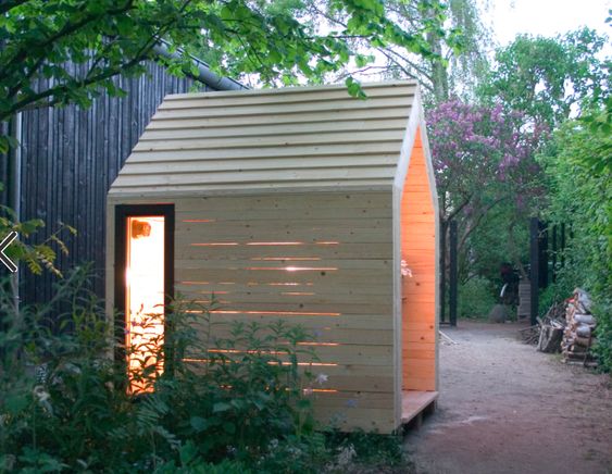 Decorative Scandinavian garden with shed