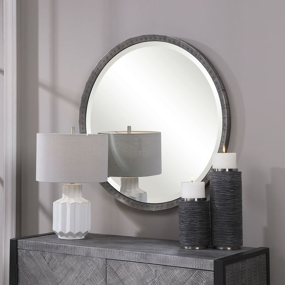 bartow round mirror in masculine bedroom