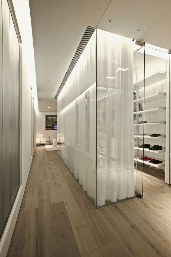 glass walk-in wardrobe design idea