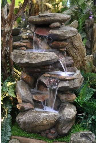 rock water fountain Japanese garden