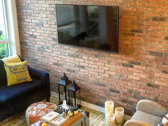 the brick accent wall living room