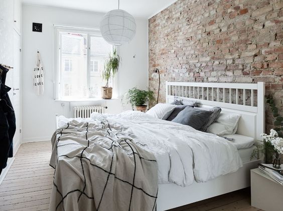 brick wall in the Scandinavian bedroom design