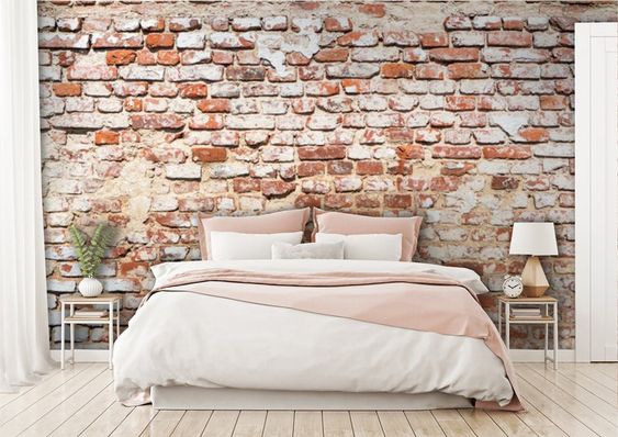 feminine bedroom with brick wall