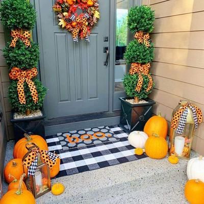 fall decoration with plaid doormat
