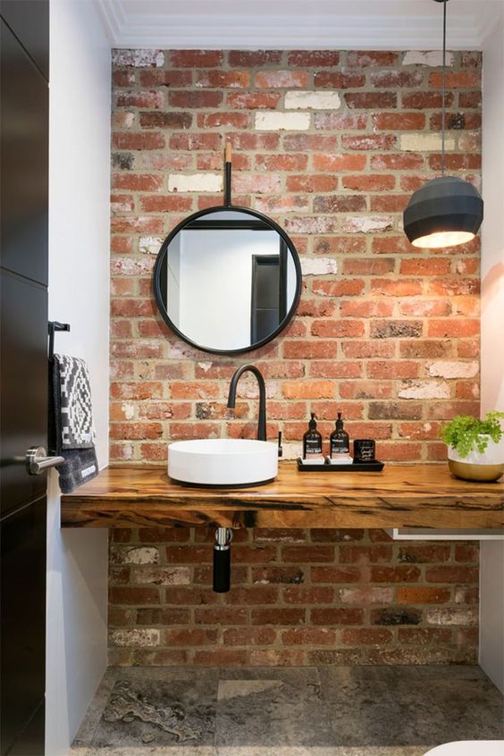 exposed brick wall bathroom