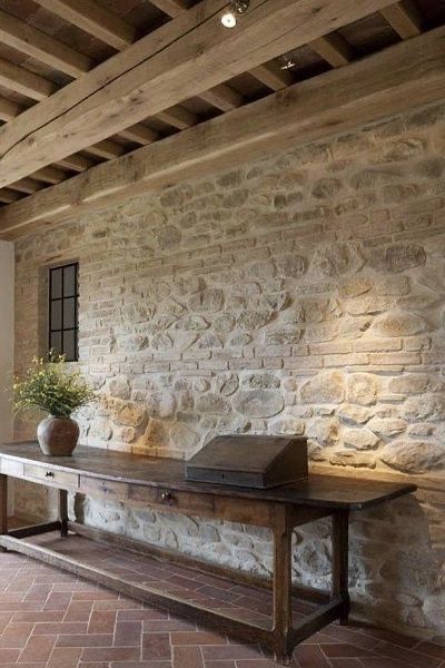 exposed brick wall with natural stones